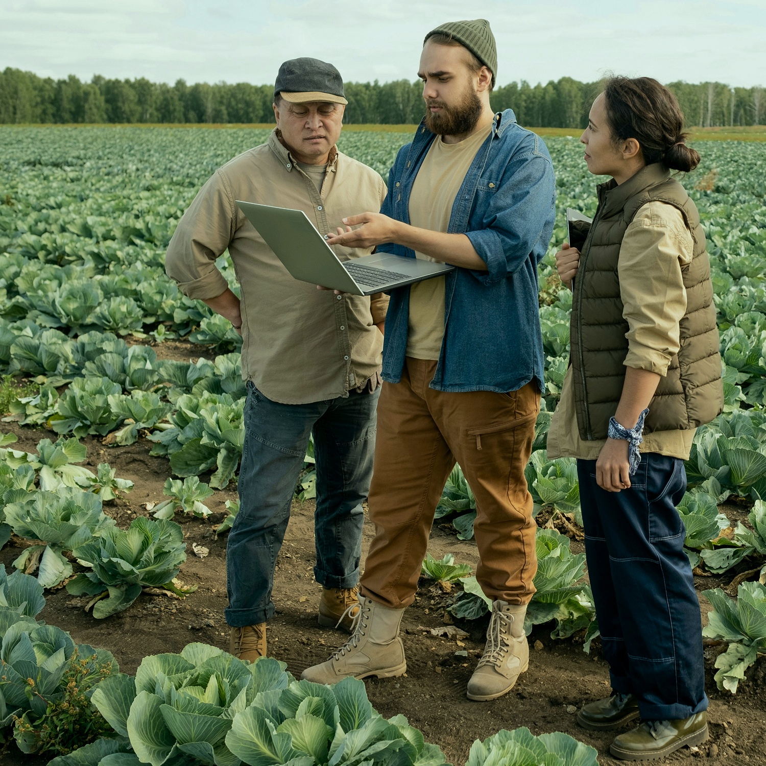 Farmer logging activities on tablet